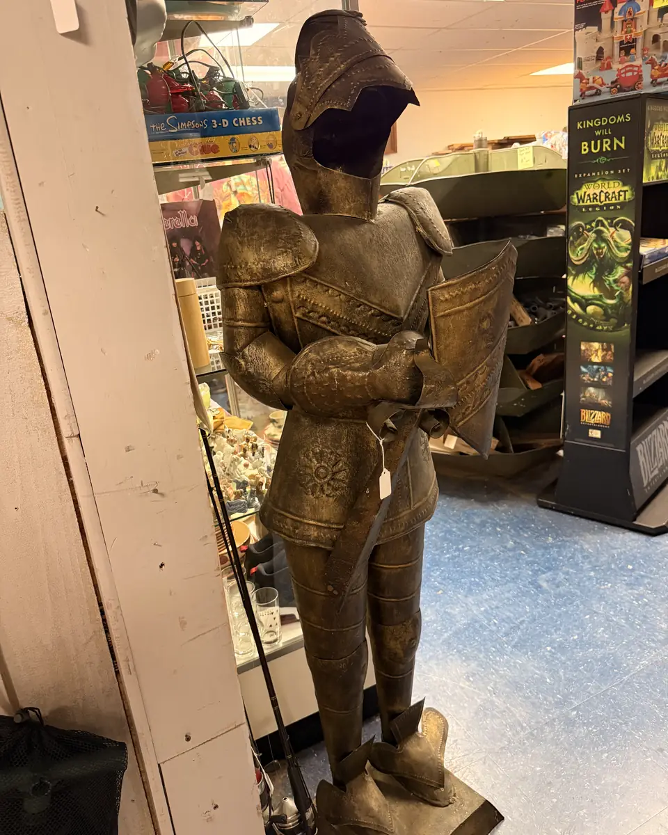 Full-height decorative suit of armor standing inside Vintage 72