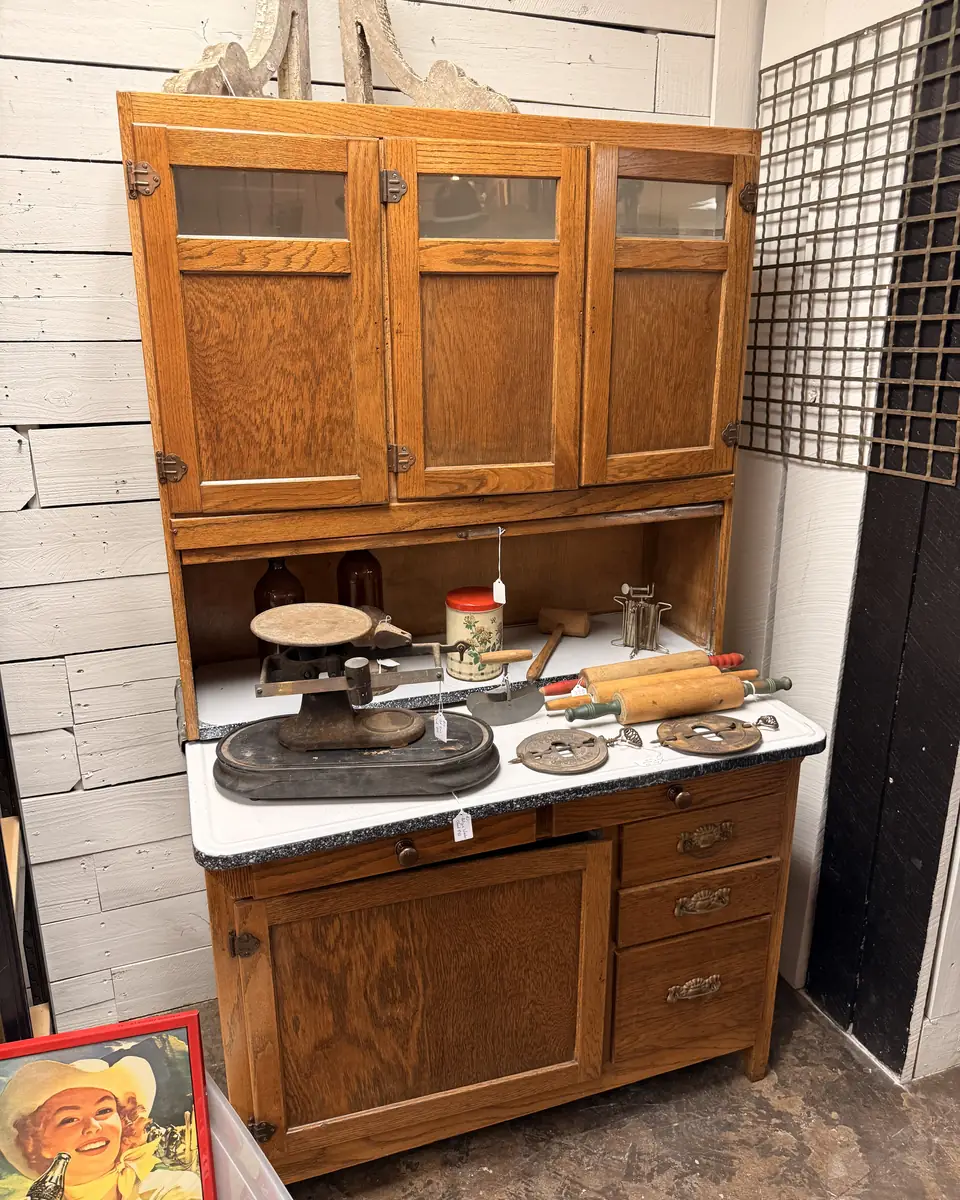 Hoosier cabinet with upper storage doors, work surface, drawers, and lower cabinet at Vintage 72