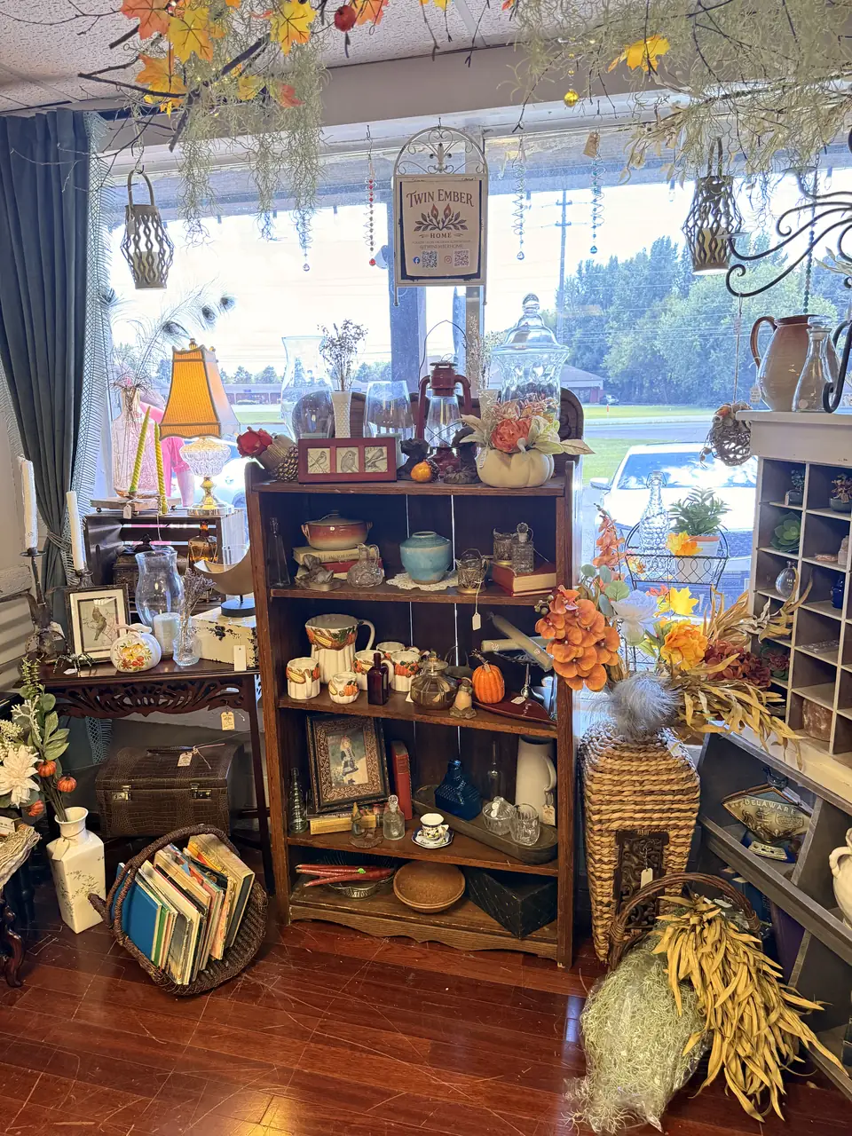 Seasonal front-window vignette welcoming shoppers into Vintage 72