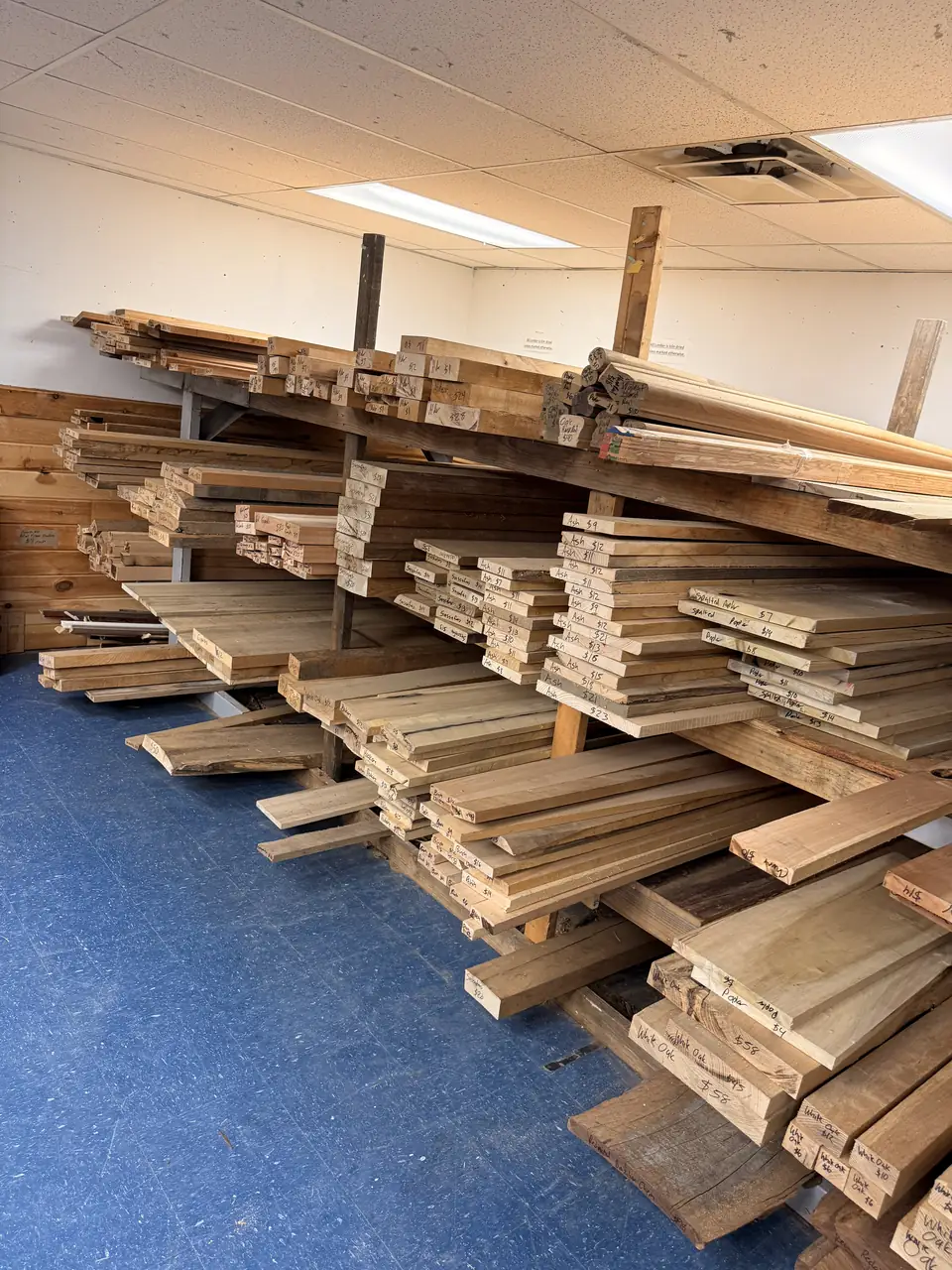 Specialty lumber room stocked with boards in many wood species and sizes