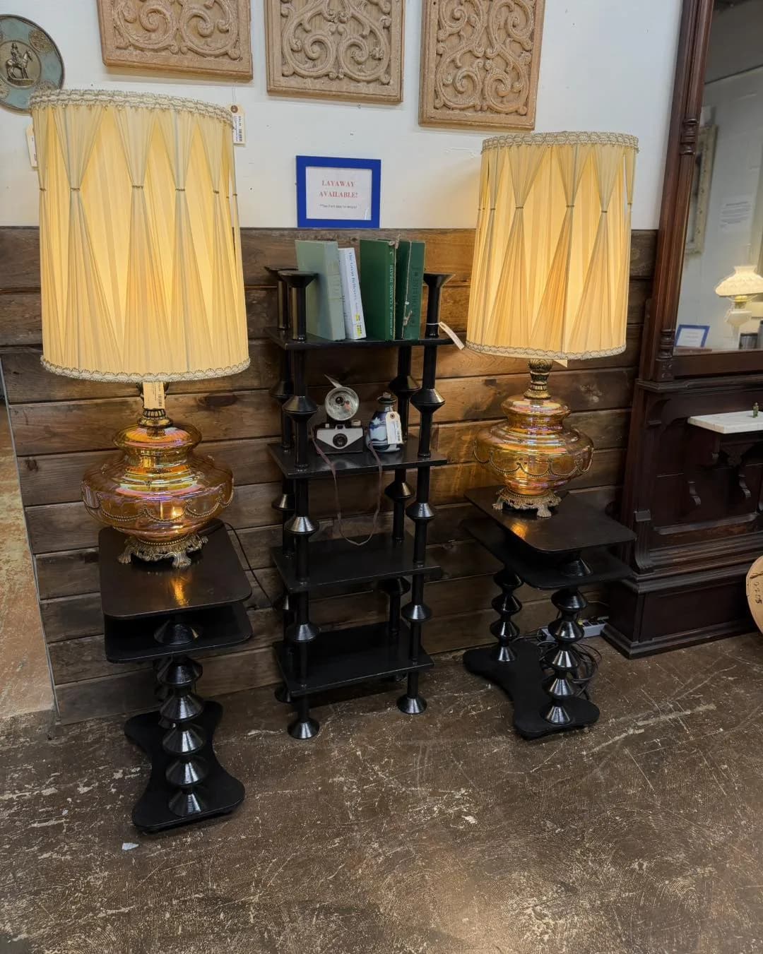 Pair of amber crystal lamps on a vendor display table