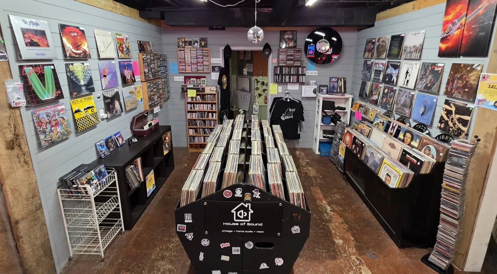 House of Sound booth with instruments and audio gear