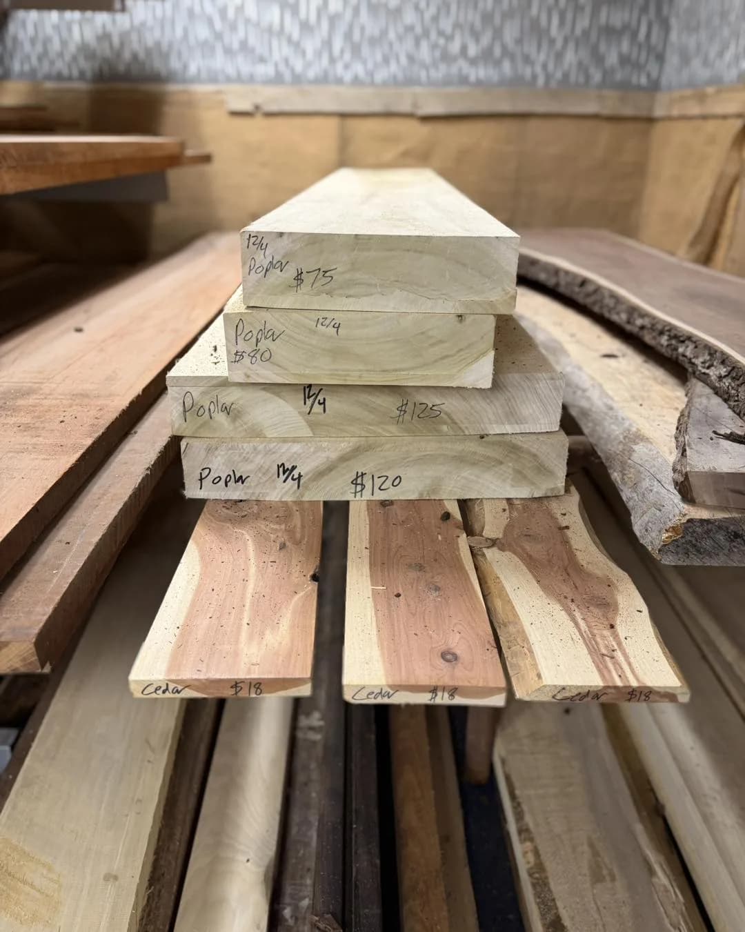 Specialty lumber — stacked poplar and cedar from the Fisk booth