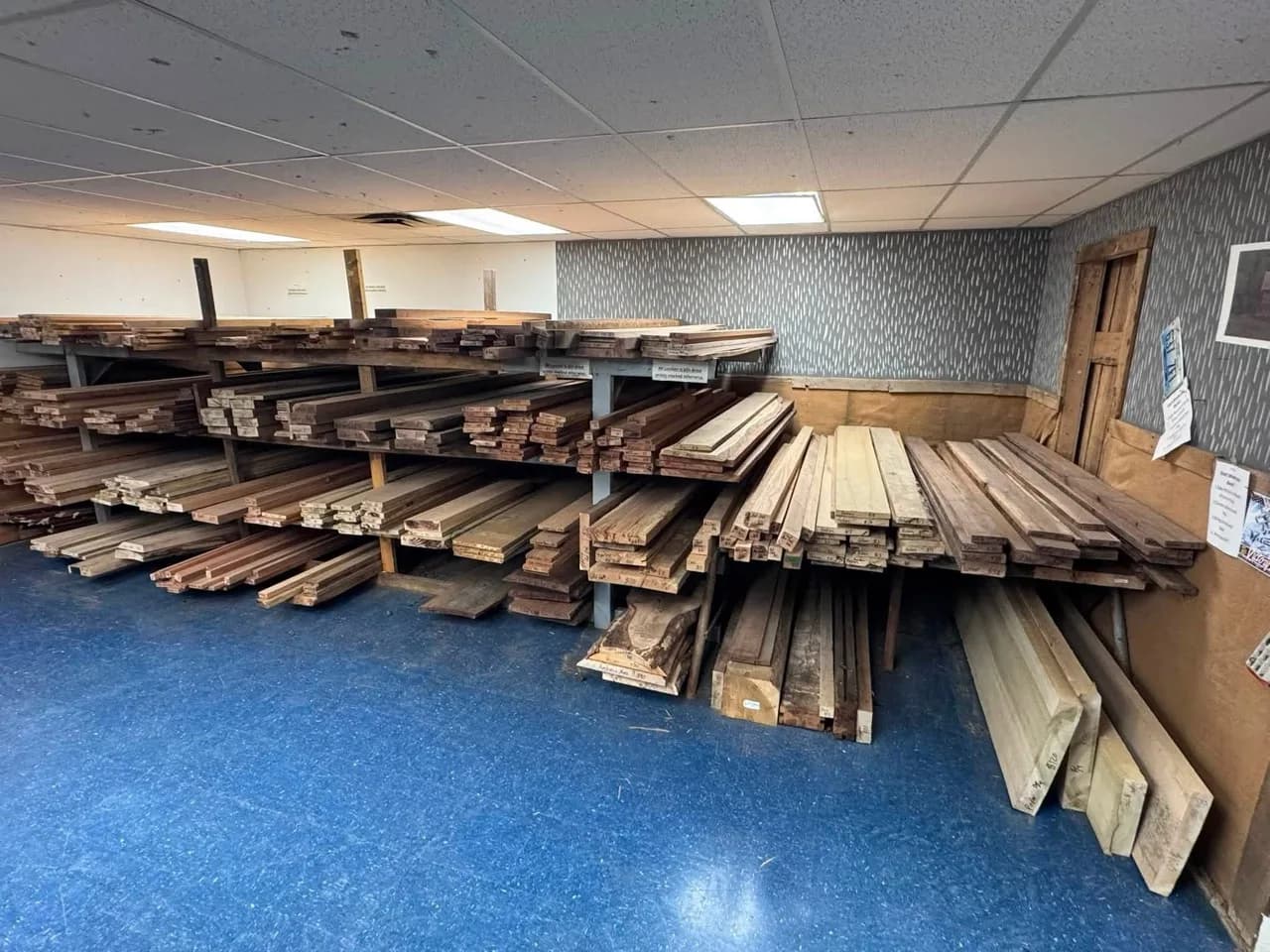 Room stocked with rows of specialty lumber in many wood species and sizes